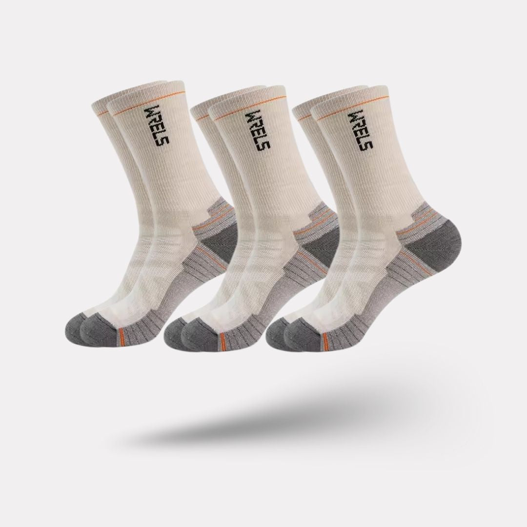 Merino wool sport socks in black, beige and yellow with a cushioned sole and ribbed cuff