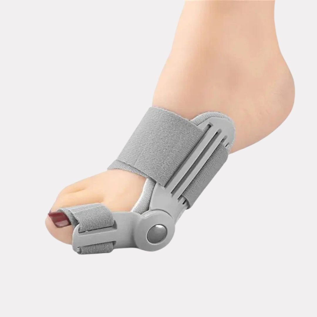 Hinged bunion splint worn over the big toe joint, letting the foot flex while it corrects