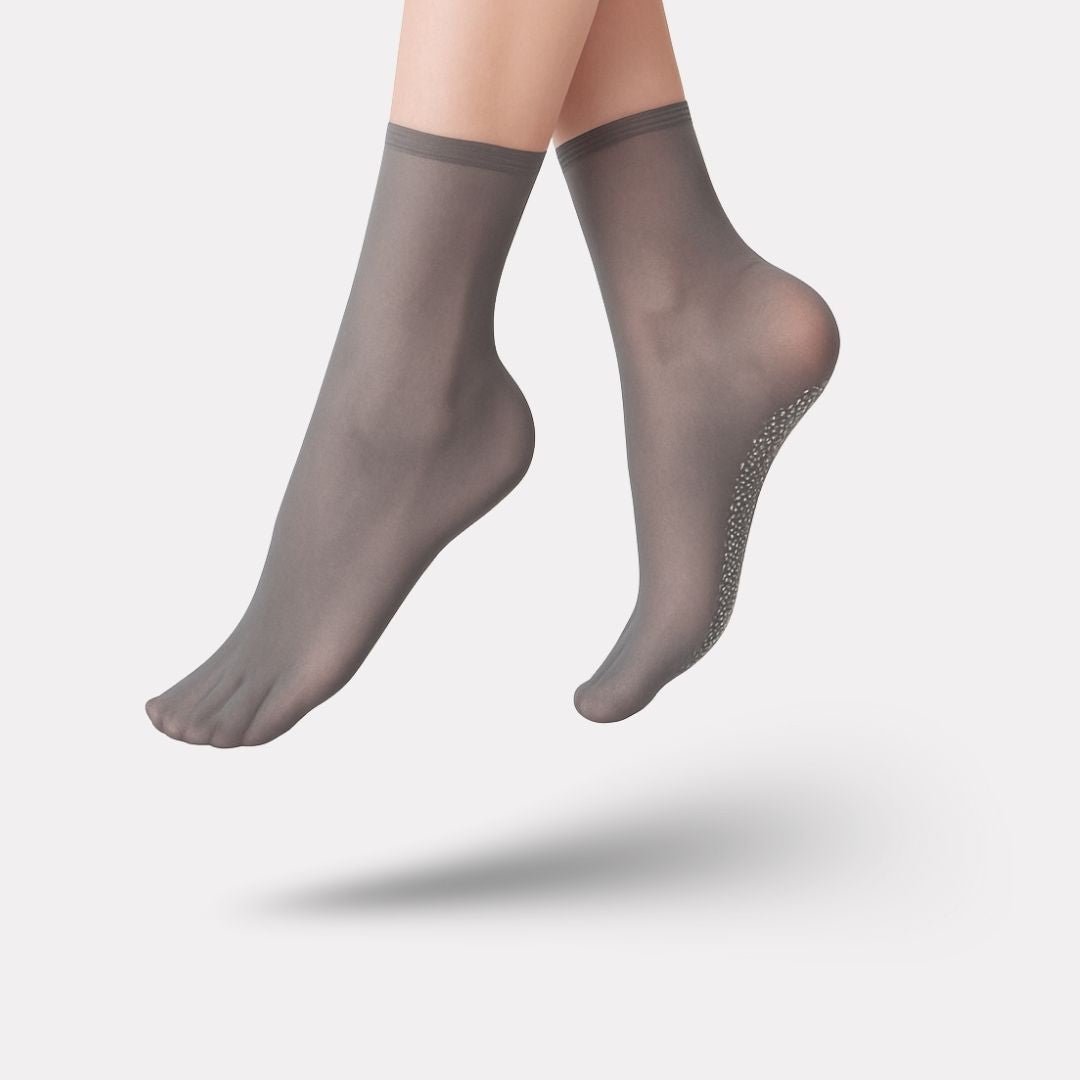 Knee-high massage socks with textured knit pressure zones along the calf