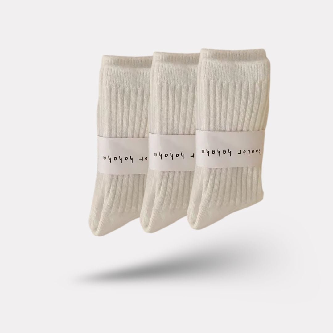 Soft wool socks for women in gray, purple, pink, black and white, sold in packs of three