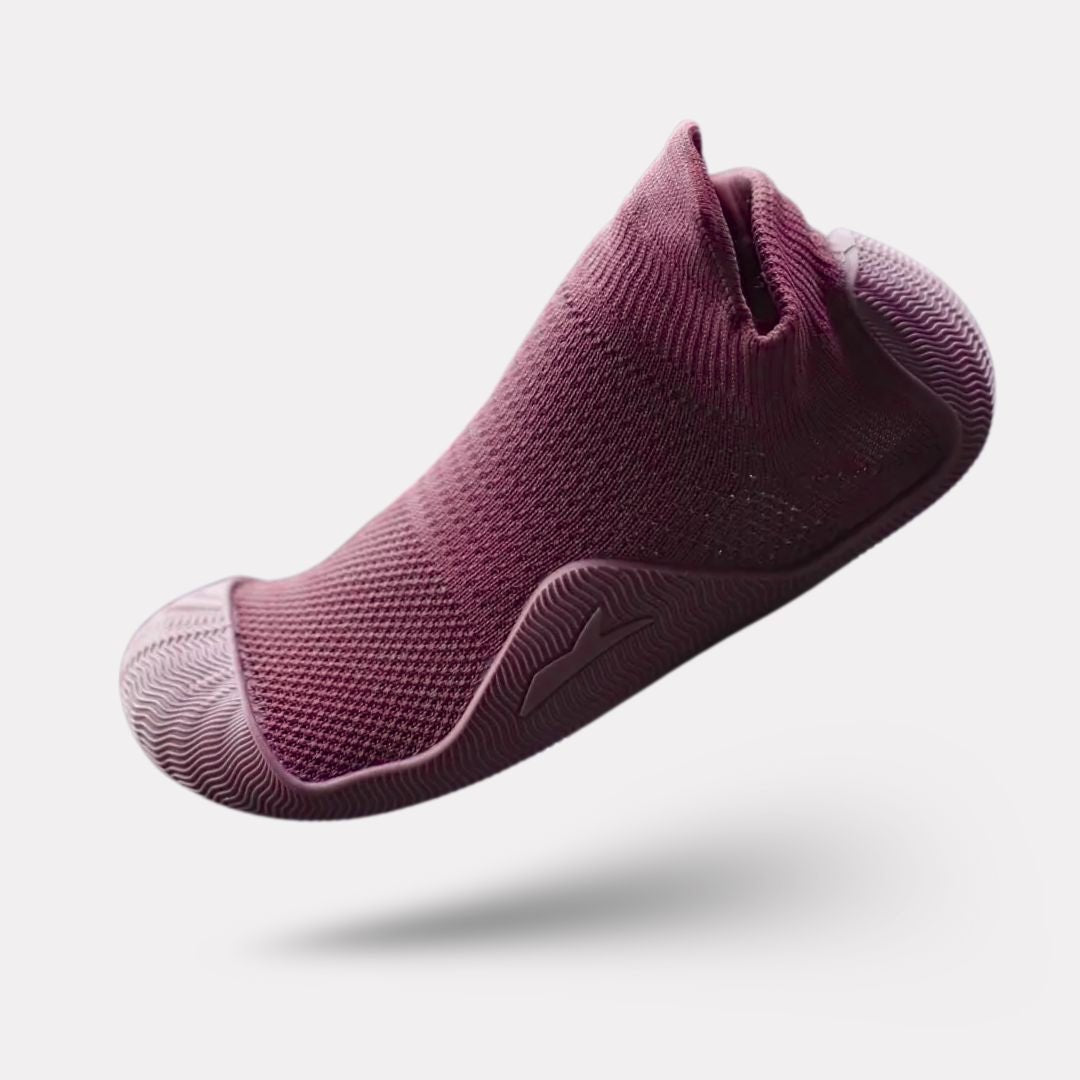 Soft barefoot style orthopedic shoes with a thin flexible sole, in gray, black, white or purple