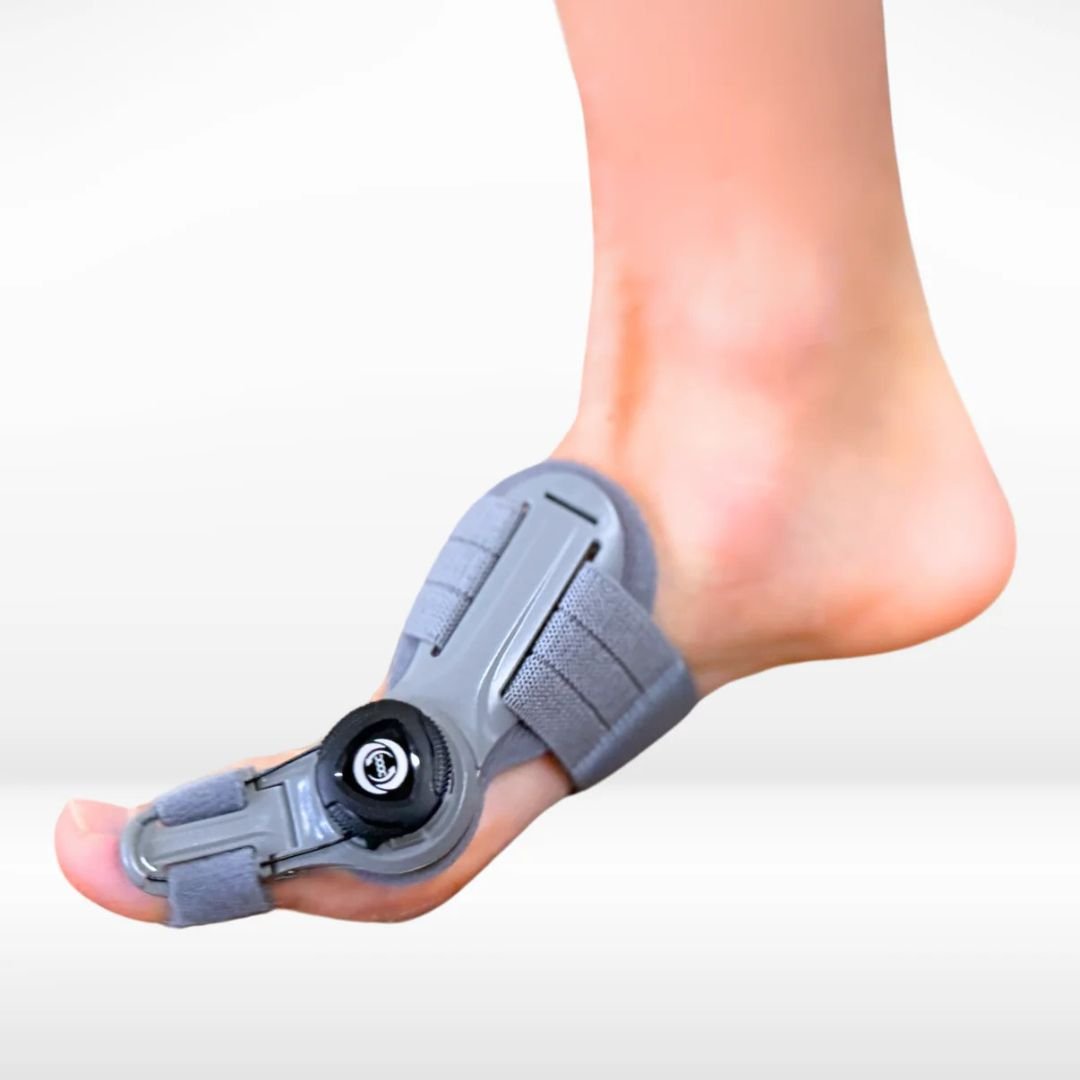 Bunion corrector strap worn over the big toe joint to hold the toe in line