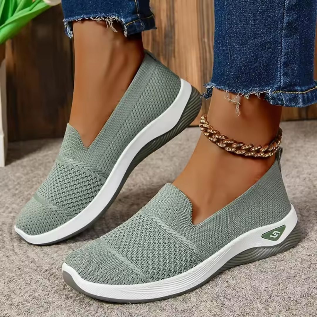 Women's orthopedic sneakers on a wide cushioned sole, in black, green, pink, gray and beige