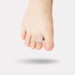 Fabric strap looped around the toes and forefoot to straighten a claw toe