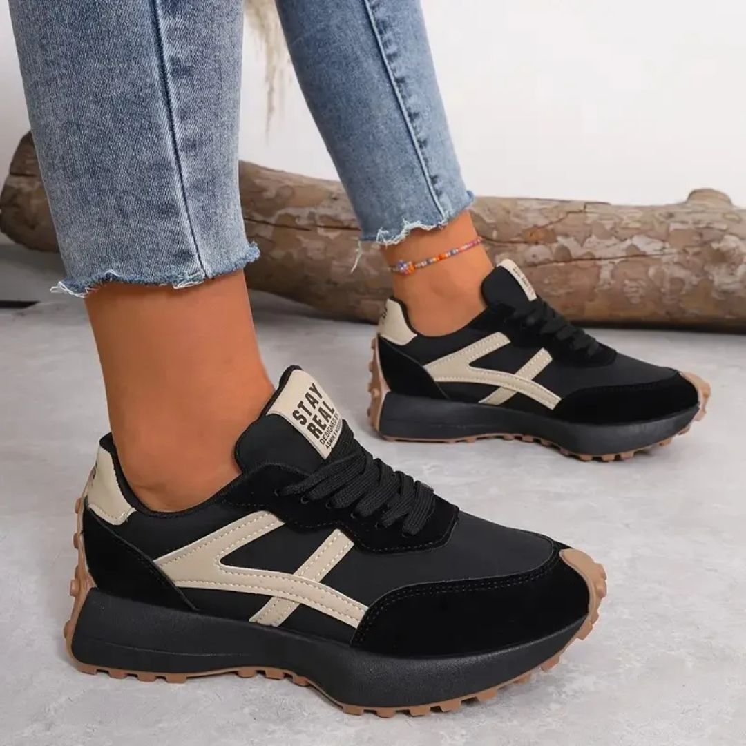 Women's orthopedic sneakers in beige, black and green with a cushioned sole