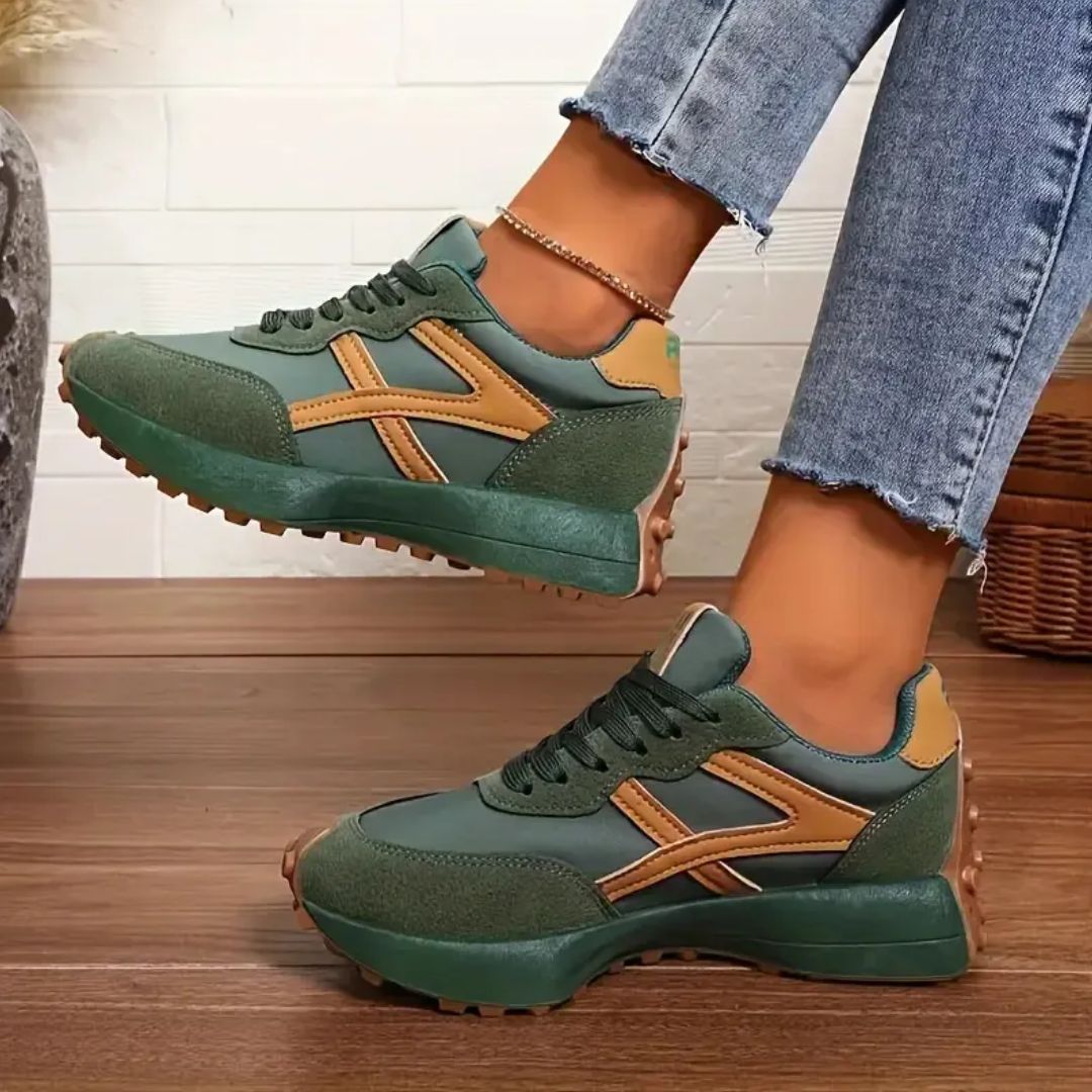 Women's orthopedic sneakers in beige, black and green with a cushioned sole
