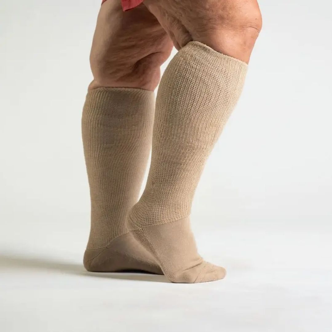 Black compression socks cut for wide calves with a graduated knit