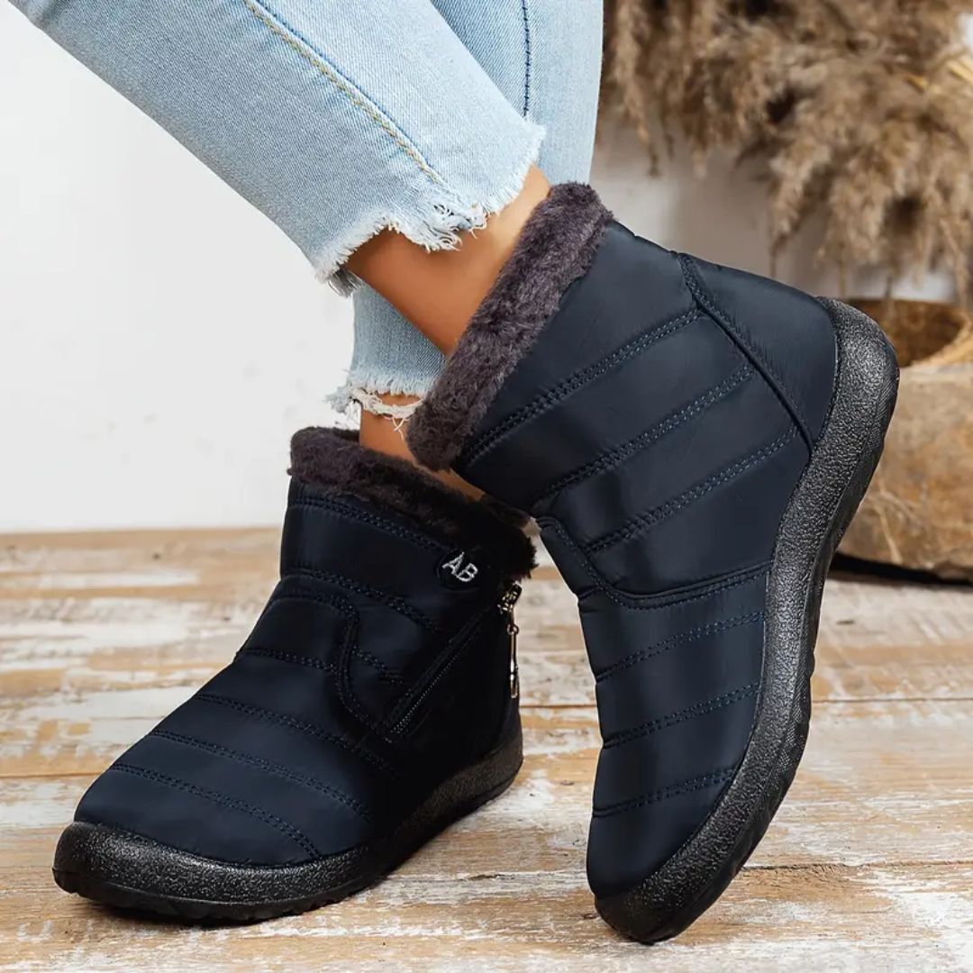 Women's waterproof winter boots in red, black, navy, gray and caramel with lugged soles