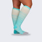 Two-tone 20-30 mmHg compression socks worn up the calf, in black, pink, blue and light blue