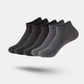 Five pairs of soft bamboo fiber socks in black and gray, worn up to mid-calf