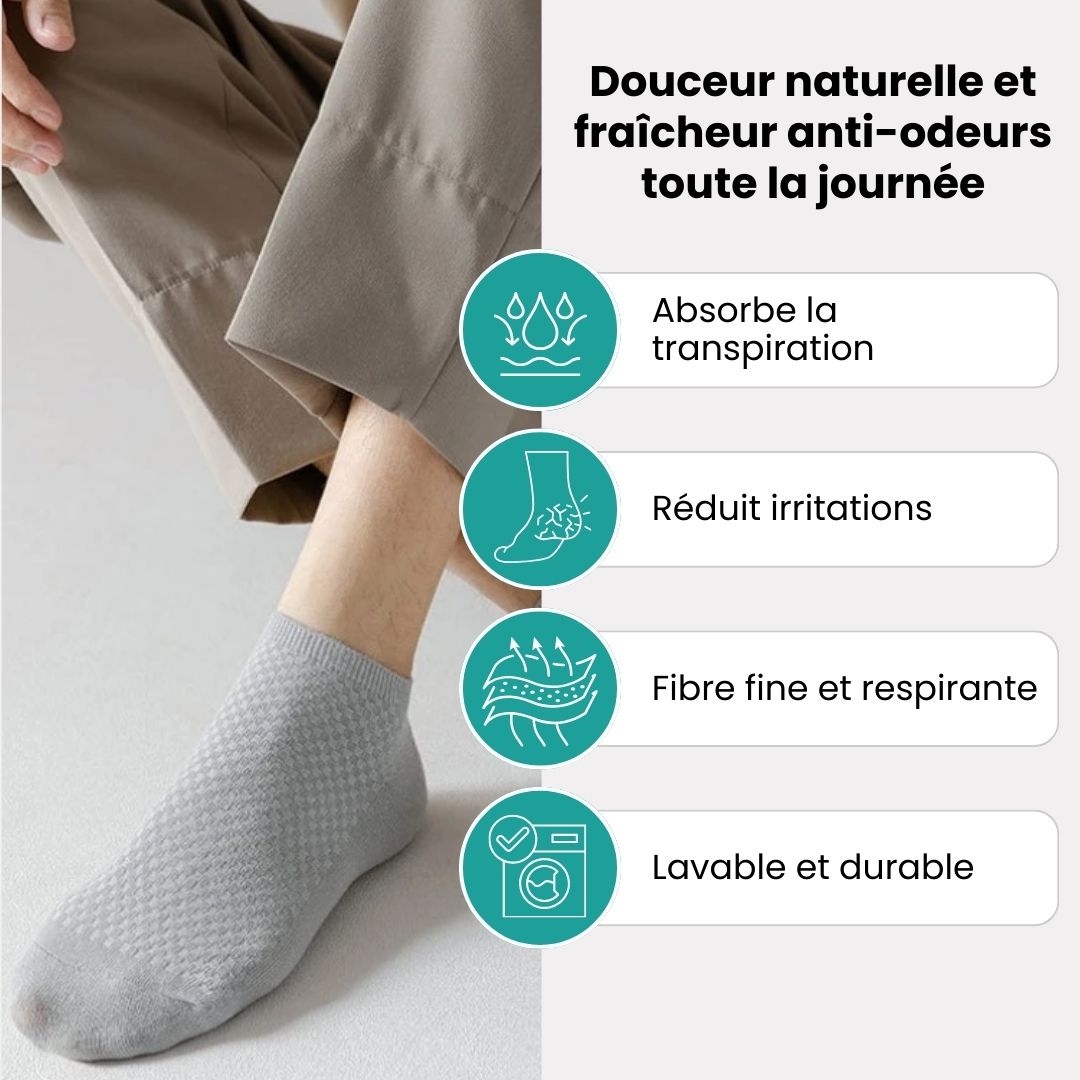 Five pairs of soft bamboo fiber socks in black and gray, worn up to mid-calf