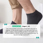 Five pairs of soft bamboo fiber socks in black and gray, worn up to mid-calf