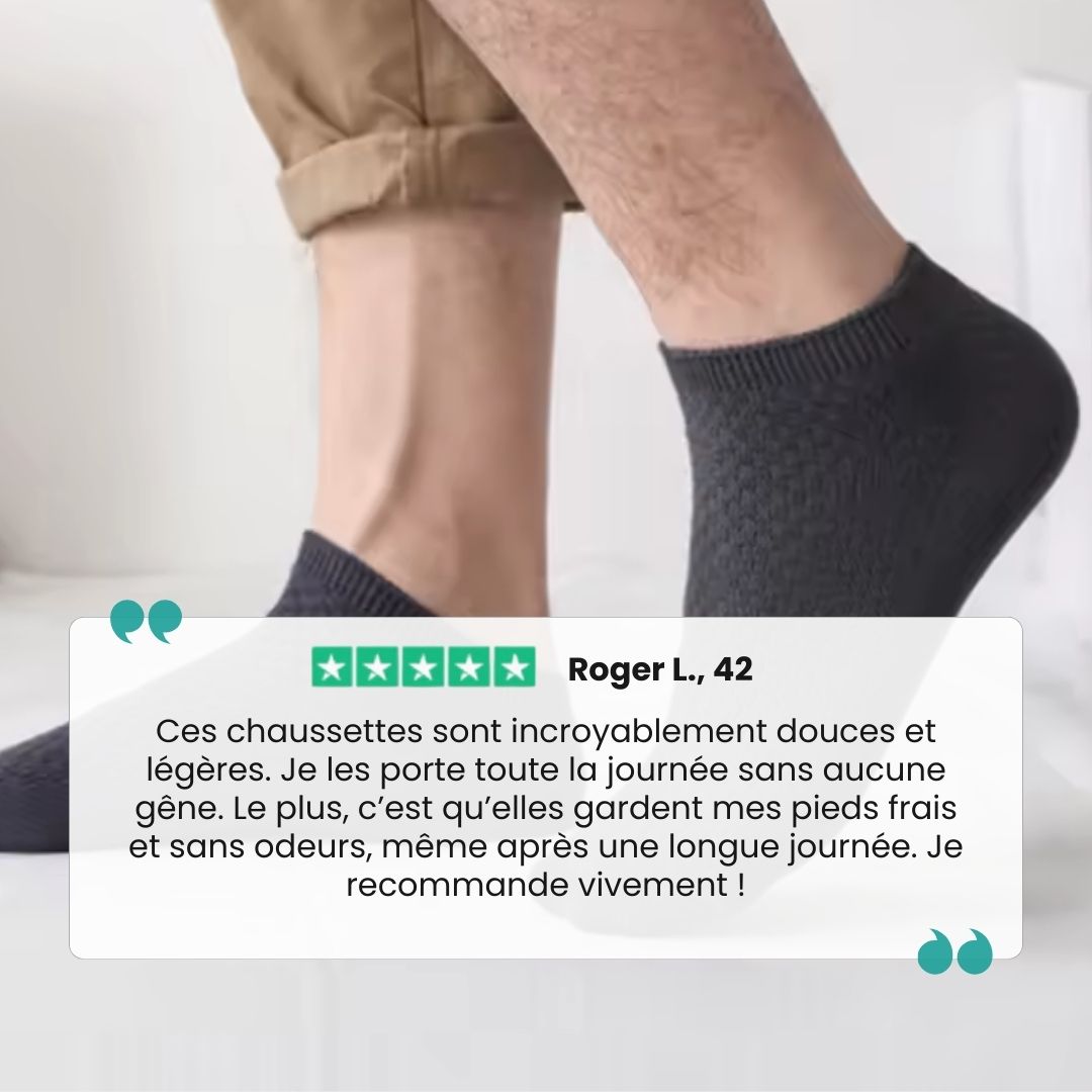 Five pairs of soft bamboo fiber socks in black and gray, worn up to mid-calf