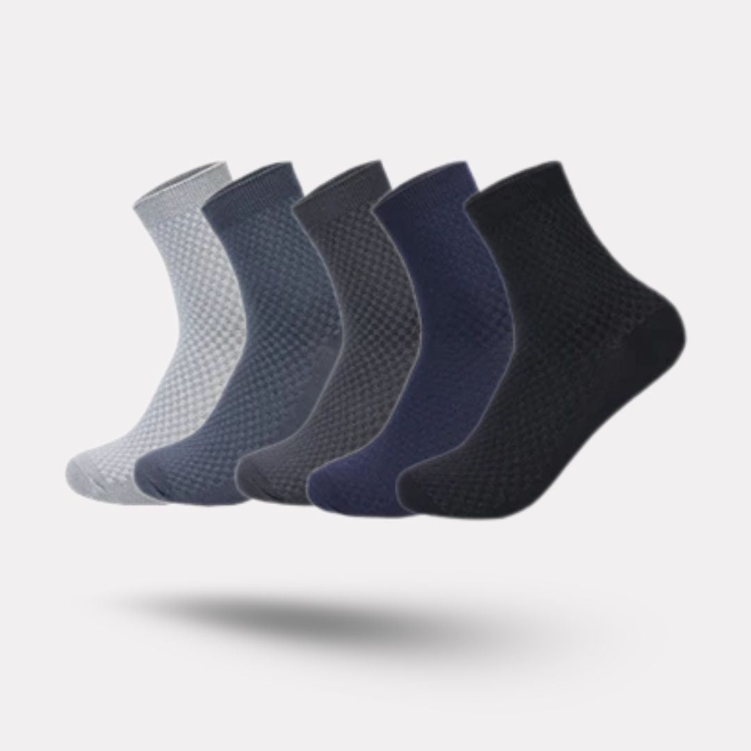Bamboo fiber crew socks worn at the ankle, in five-pair packs of black, gray or navy