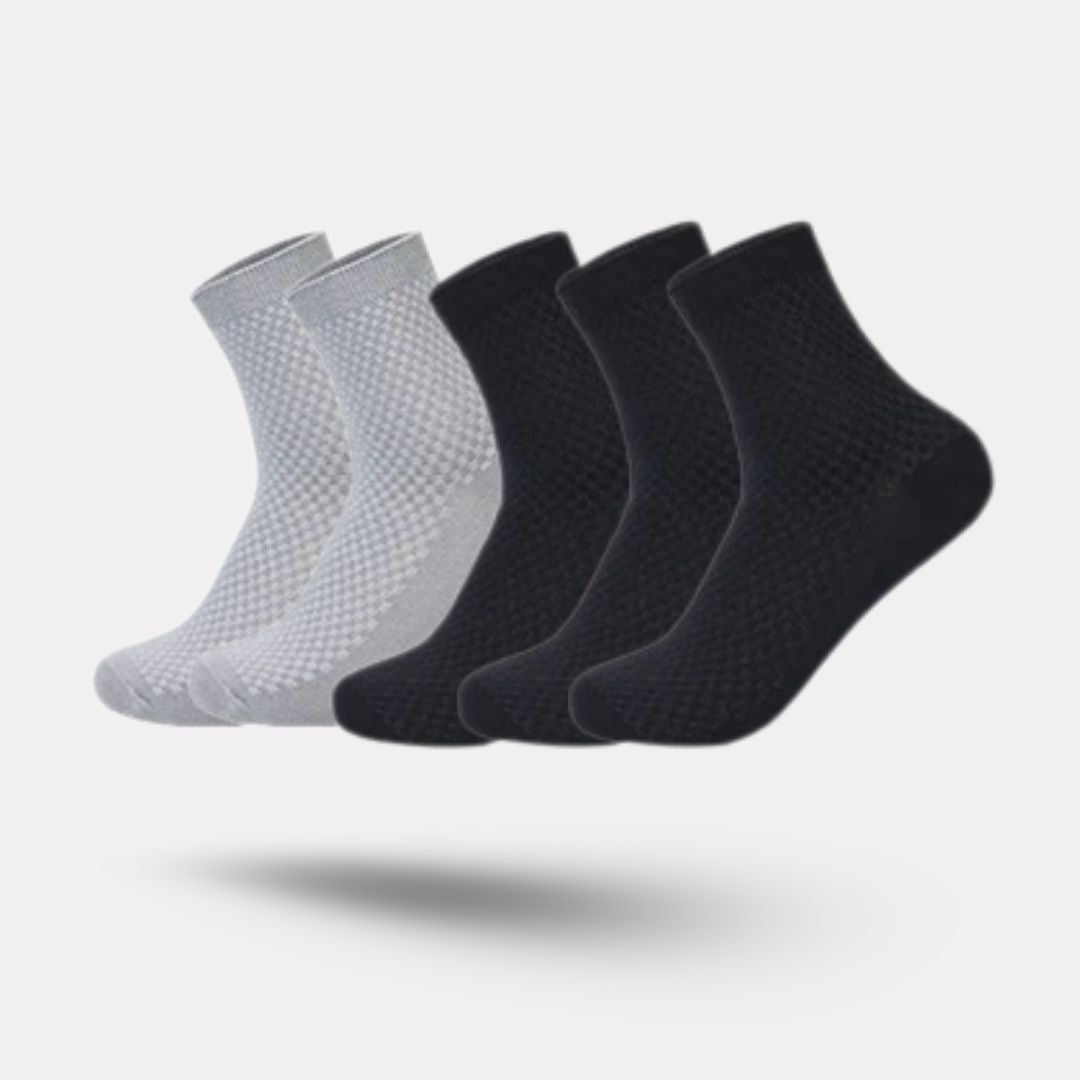 Bamboo fiber crew socks worn at the ankle, in five-pair packs of black, gray or navy
