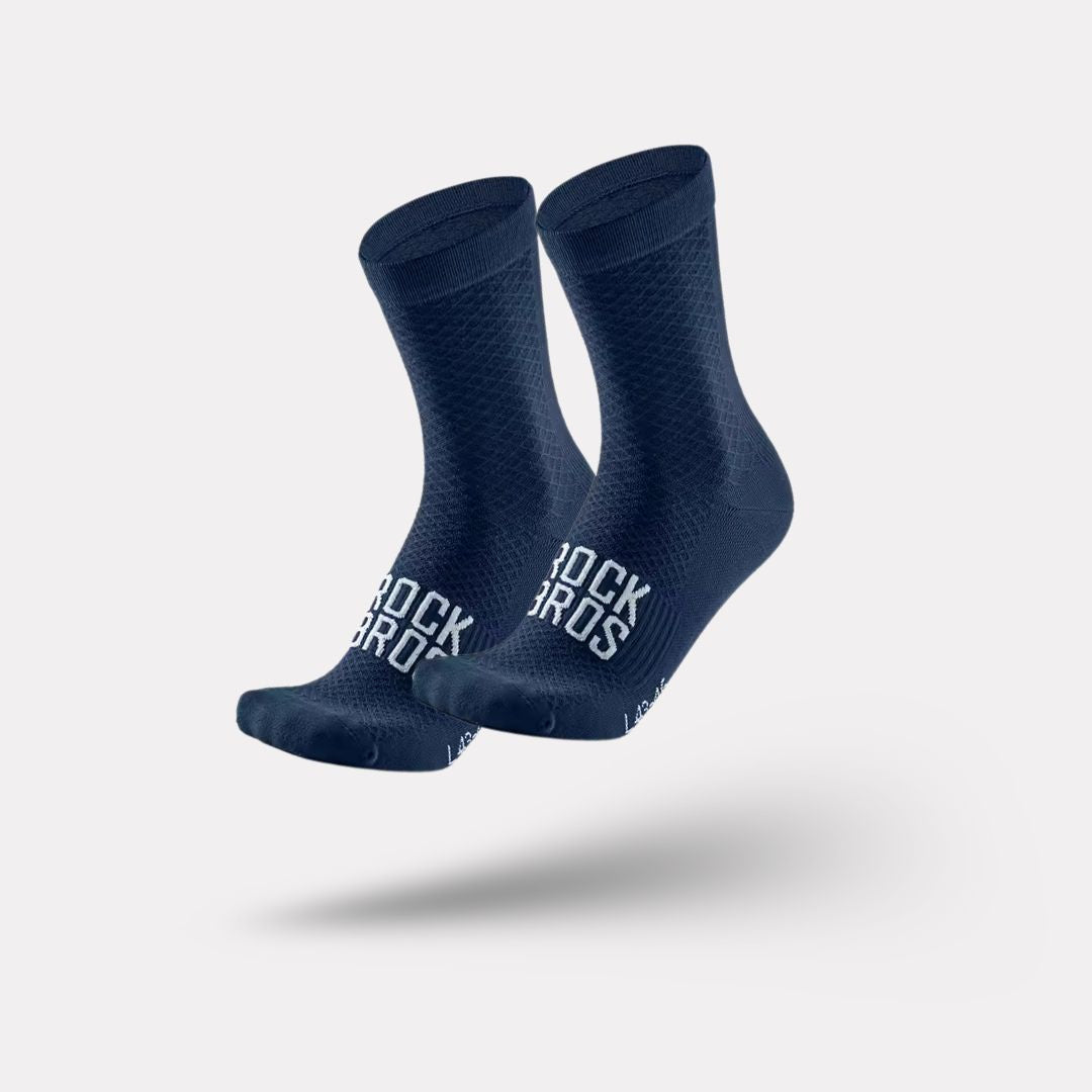 Pair of blue outdoor cycling socks ribbed at the calf with a snug footbed