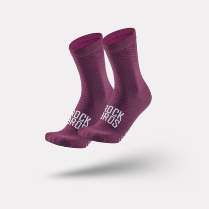 Pair of blue outdoor cycling socks ribbed at the calf with a snug footbed