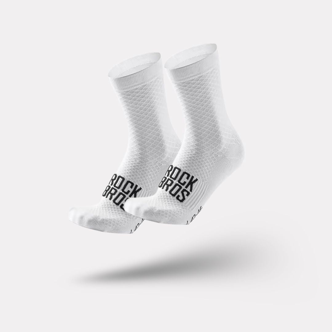 Pair of blue outdoor cycling socks ribbed at the calf with a snug footbed