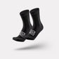 Pair of blue outdoor cycling socks ribbed at the calf with a snug footbed