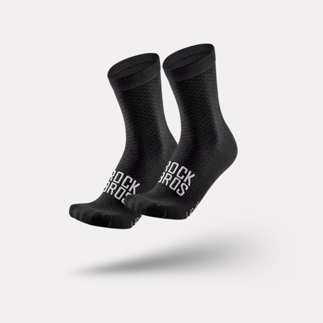 Pair of blue outdoor cycling socks ribbed at the calf with a snug footbed