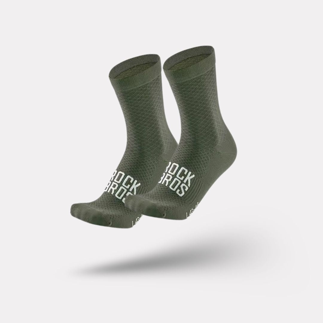 Pair of blue outdoor cycling socks ribbed at the calf with a snug footbed
