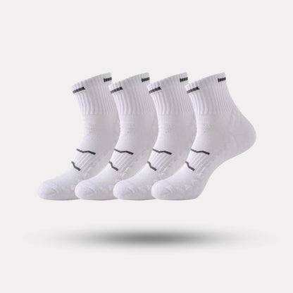 Black and white running socks in ankle and crew heights with a reinforced arch band