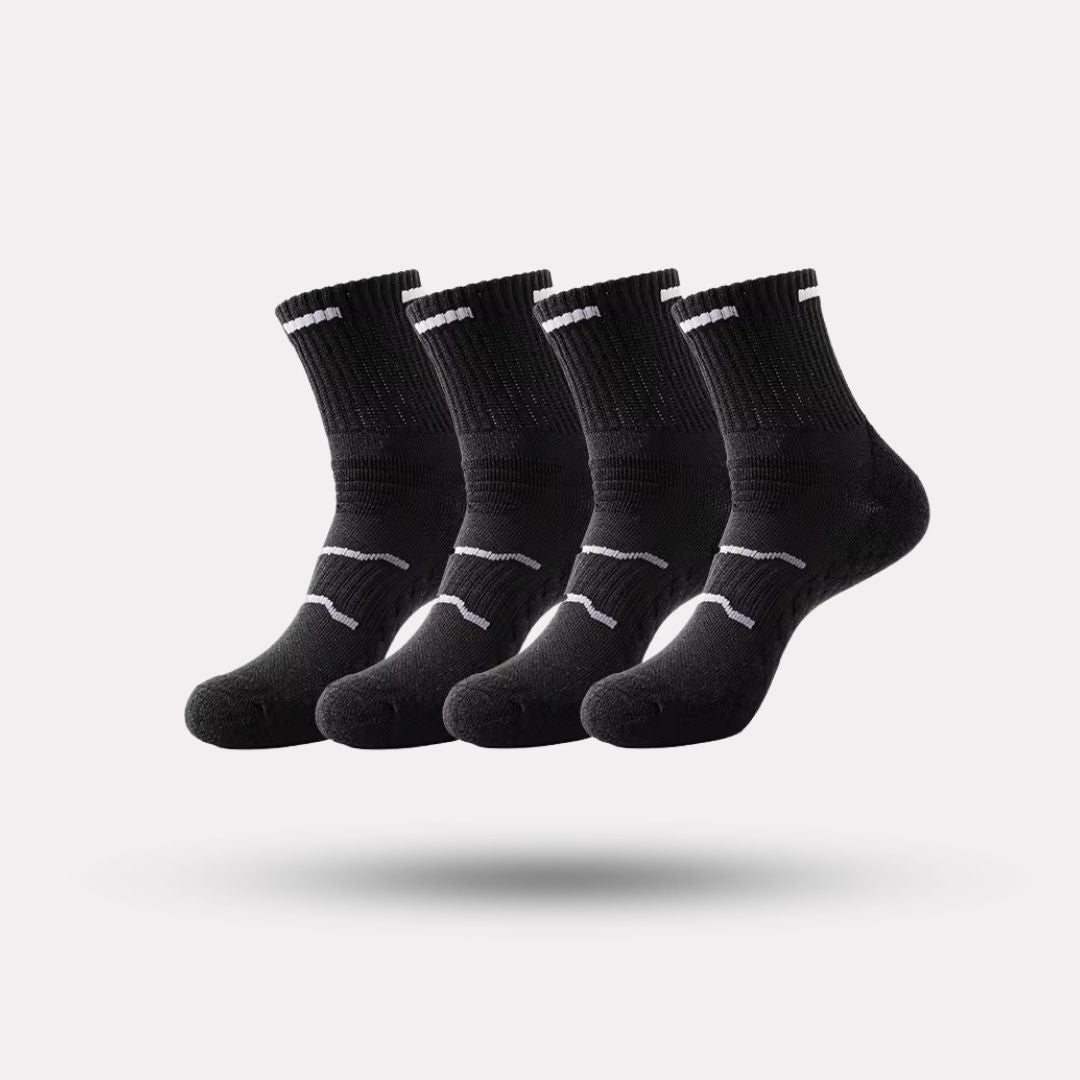 Black and white running socks in ankle and crew heights with a reinforced arch band
