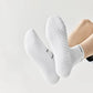 Black and white running socks in ankle and crew heights with a reinforced arch band