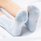 Four pairs of soft breathable cotton socks for children, worn on the foot and ankle