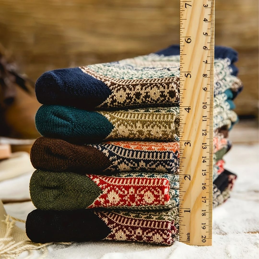 Four pairs of thick wool socks knitted to sit mid-calf for winter warmth
