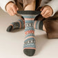 Four pairs of thick wool socks knitted to sit mid-calf for winter warmth