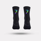 Black cycling socks with reflective stripes, worn high on the calf