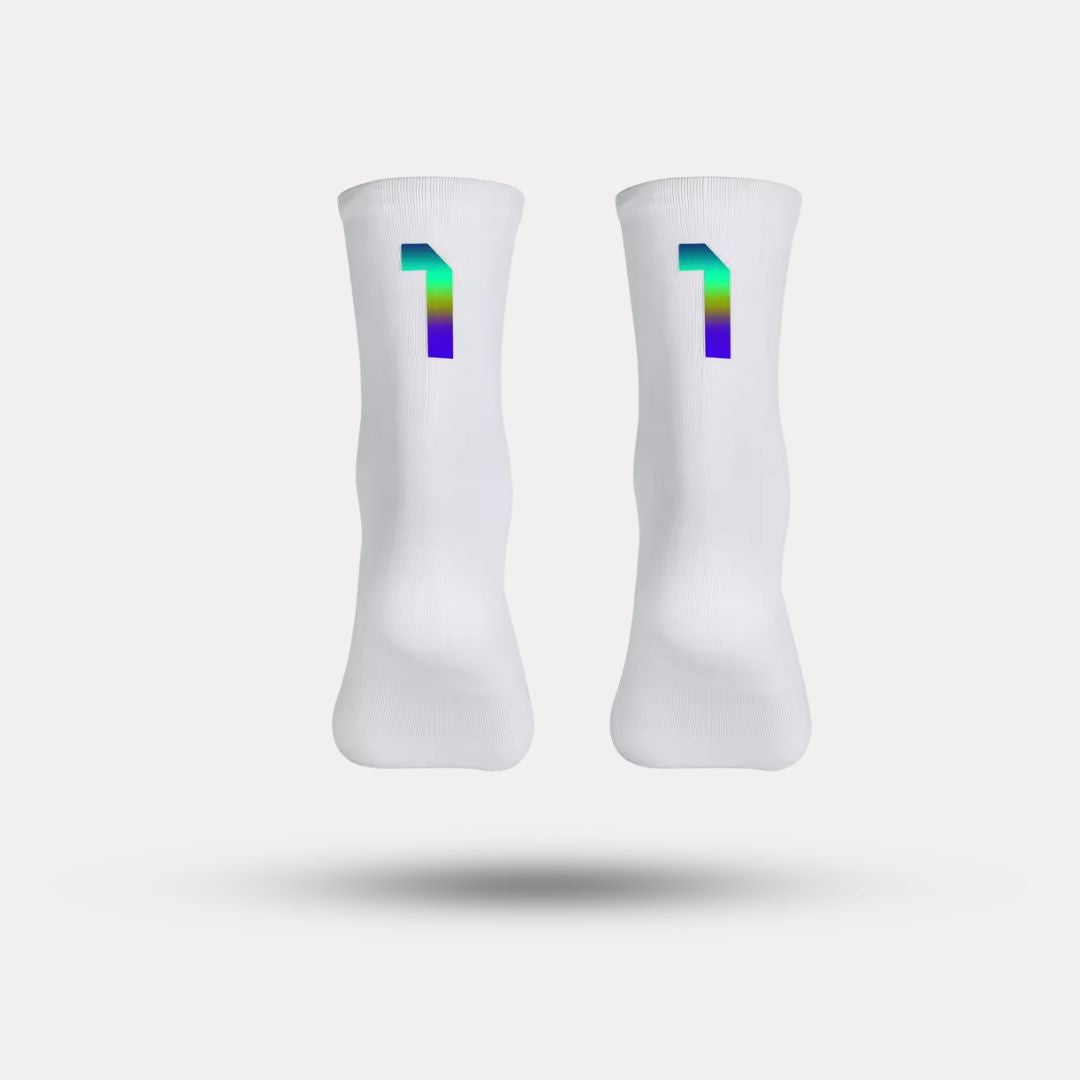 Black cycling socks with reflective stripes, worn high on the calf