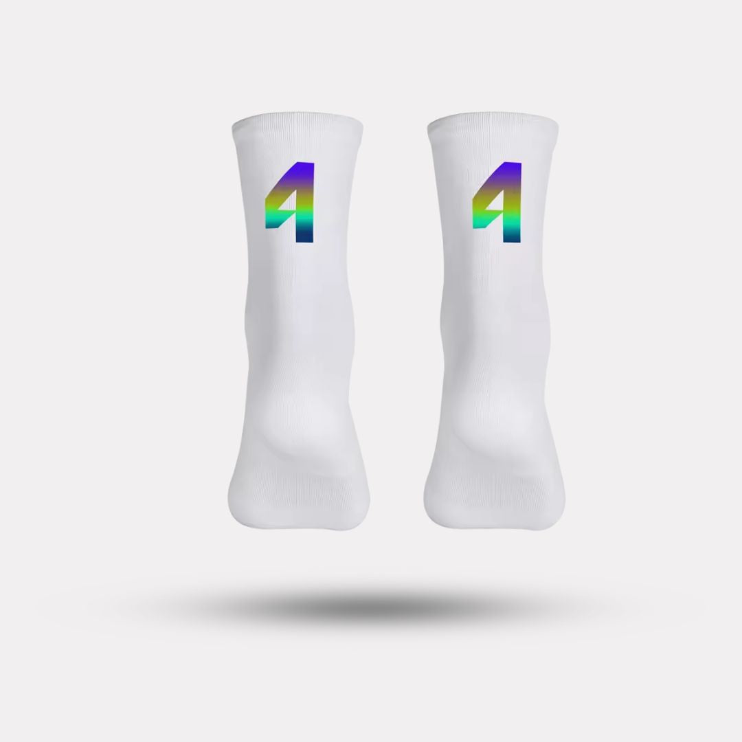 Black cycling socks with reflective stripes, worn high on the calf