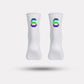 Black cycling socks with reflective stripes, worn high on the calf