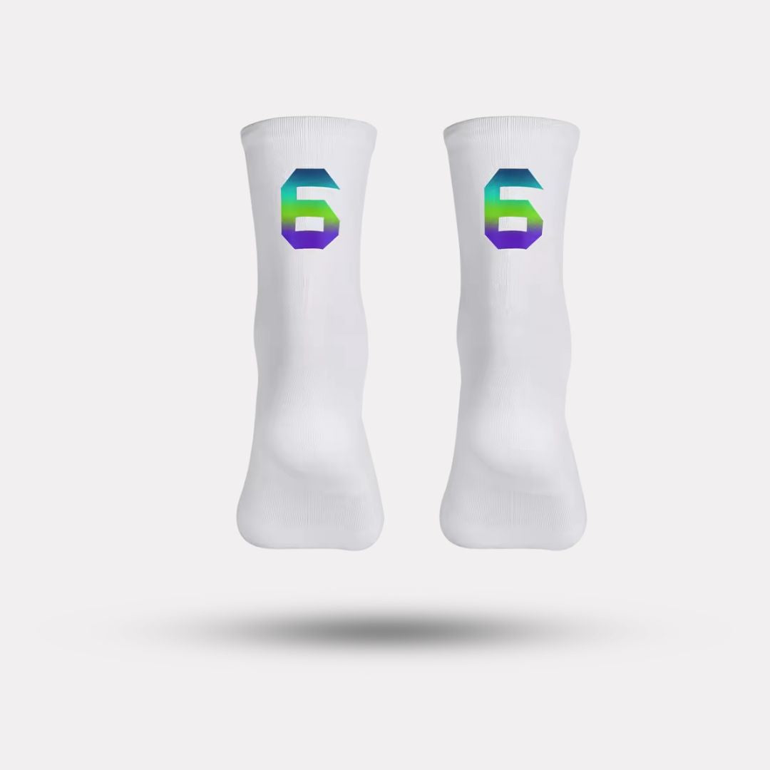 Black cycling socks with reflective stripes, worn high on the calf
