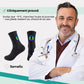 Black cycling socks with reflective stripes, worn high on the calf