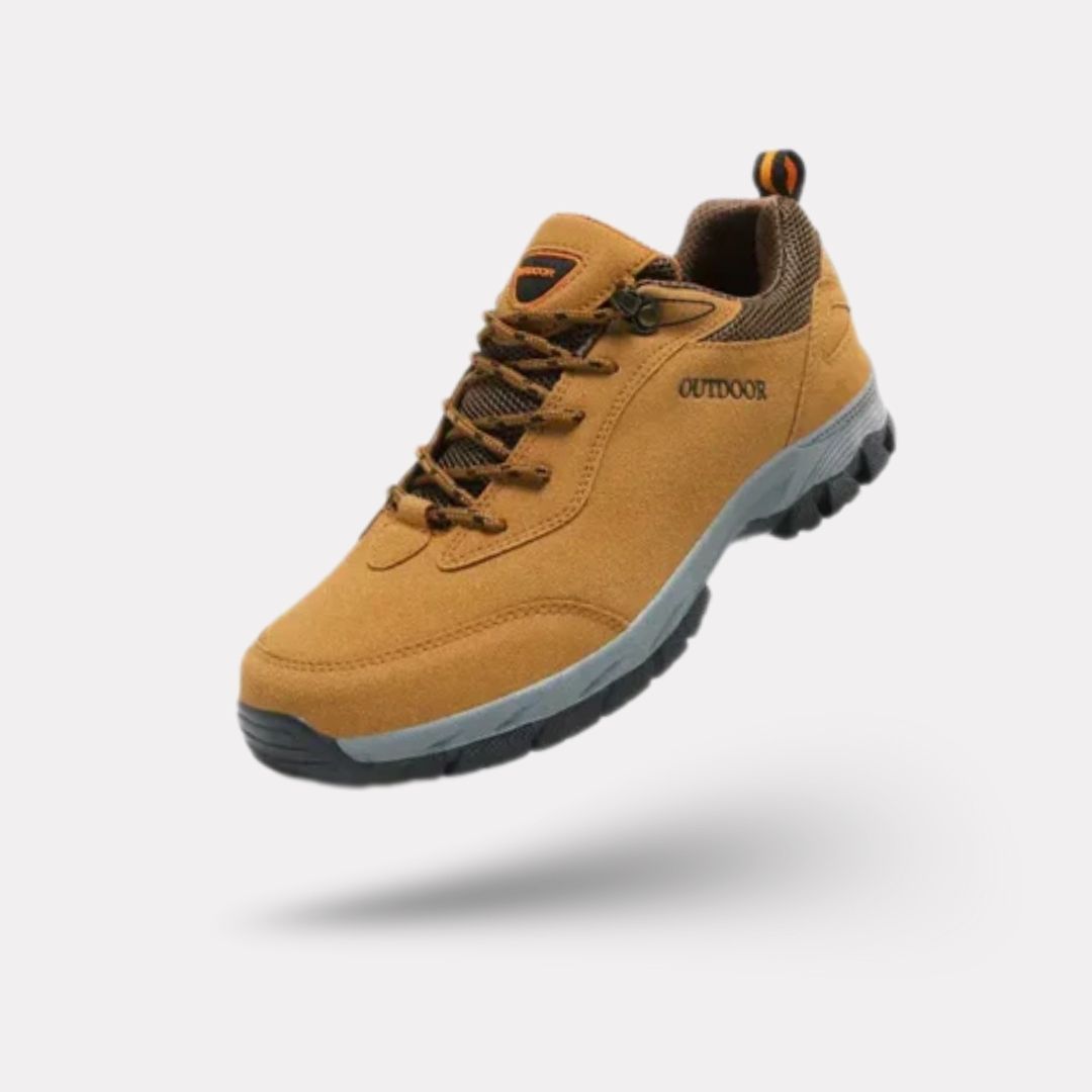 Dark gray hiking shoes with a lugged rubber outsole and a padded ankle collar