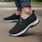 Black orthopedic walking shoes for men with a cushioned midsole and lace-up fit