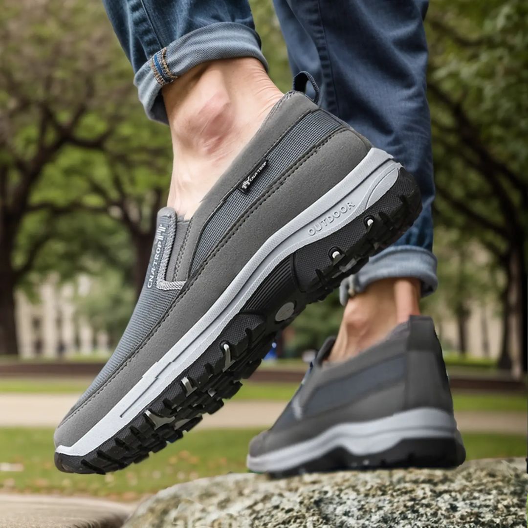 Black orthopedic walking shoes for men with a cushioned midsole and lace-up fit