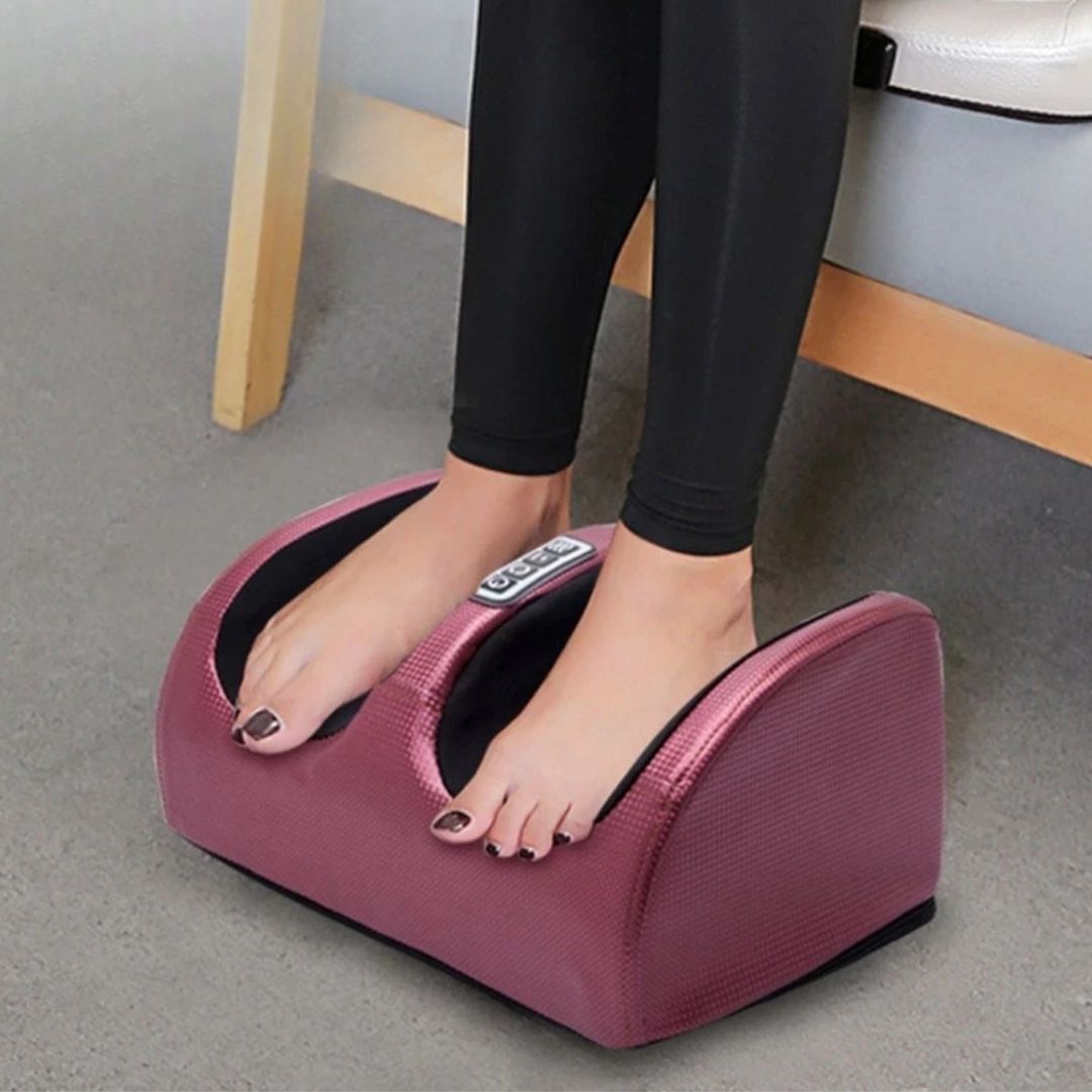 Heated electric foot massager in red, gold and black with an open cradle for both feet