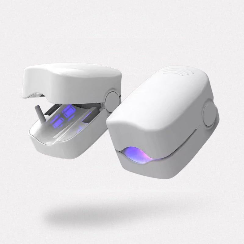 Clip-on UV lamp positioned over the toenail for painless fungus treatment