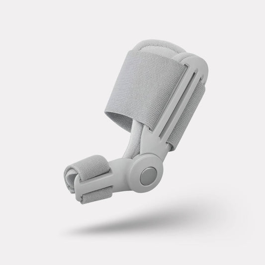 Hinged bunion splint worn over the big toe joint, letting the foot flex while it corrects