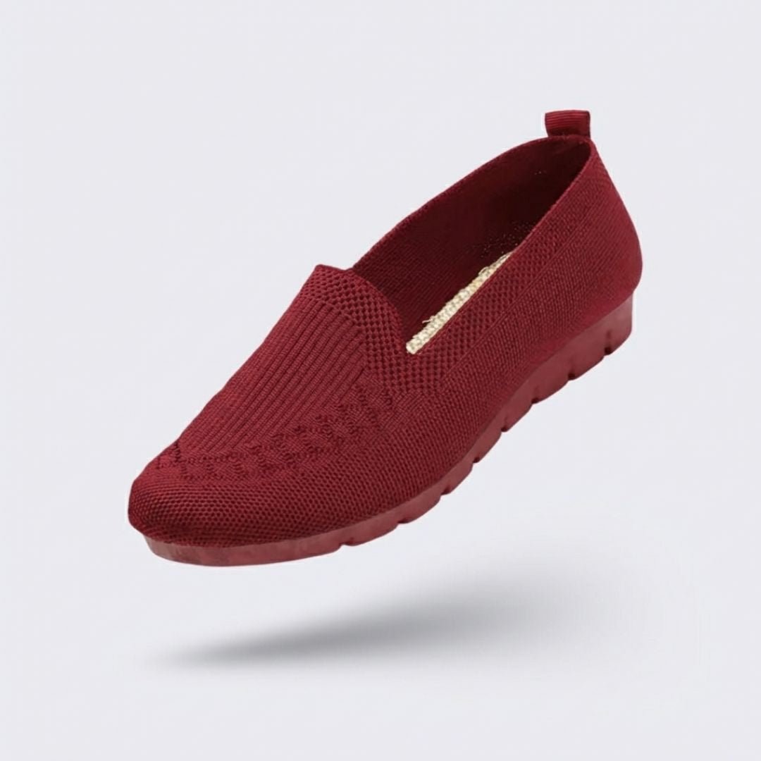 Black orthopedic flats for women with a soft rounded toe and padded insole