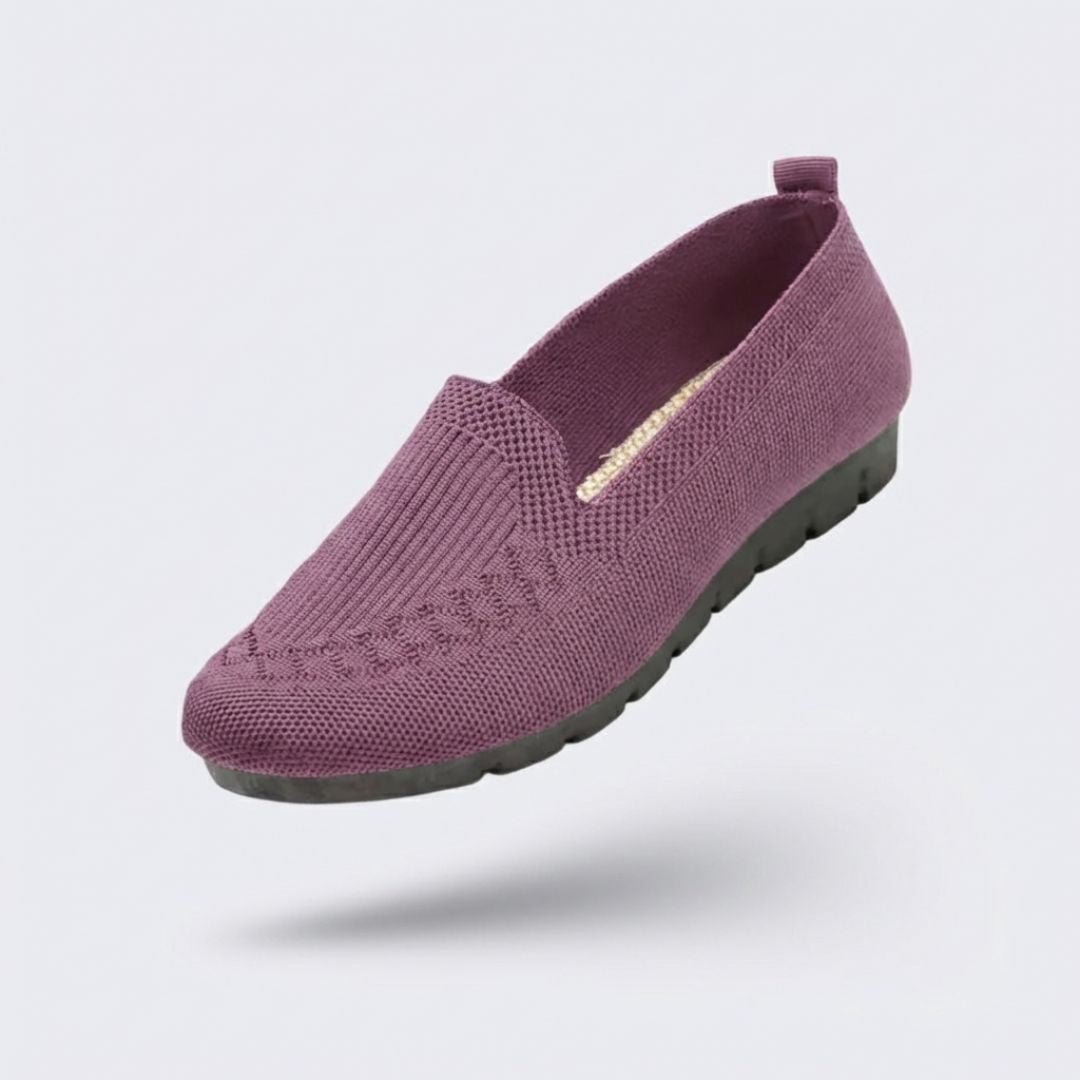 Black orthopedic flats for women with a soft rounded toe and padded insole