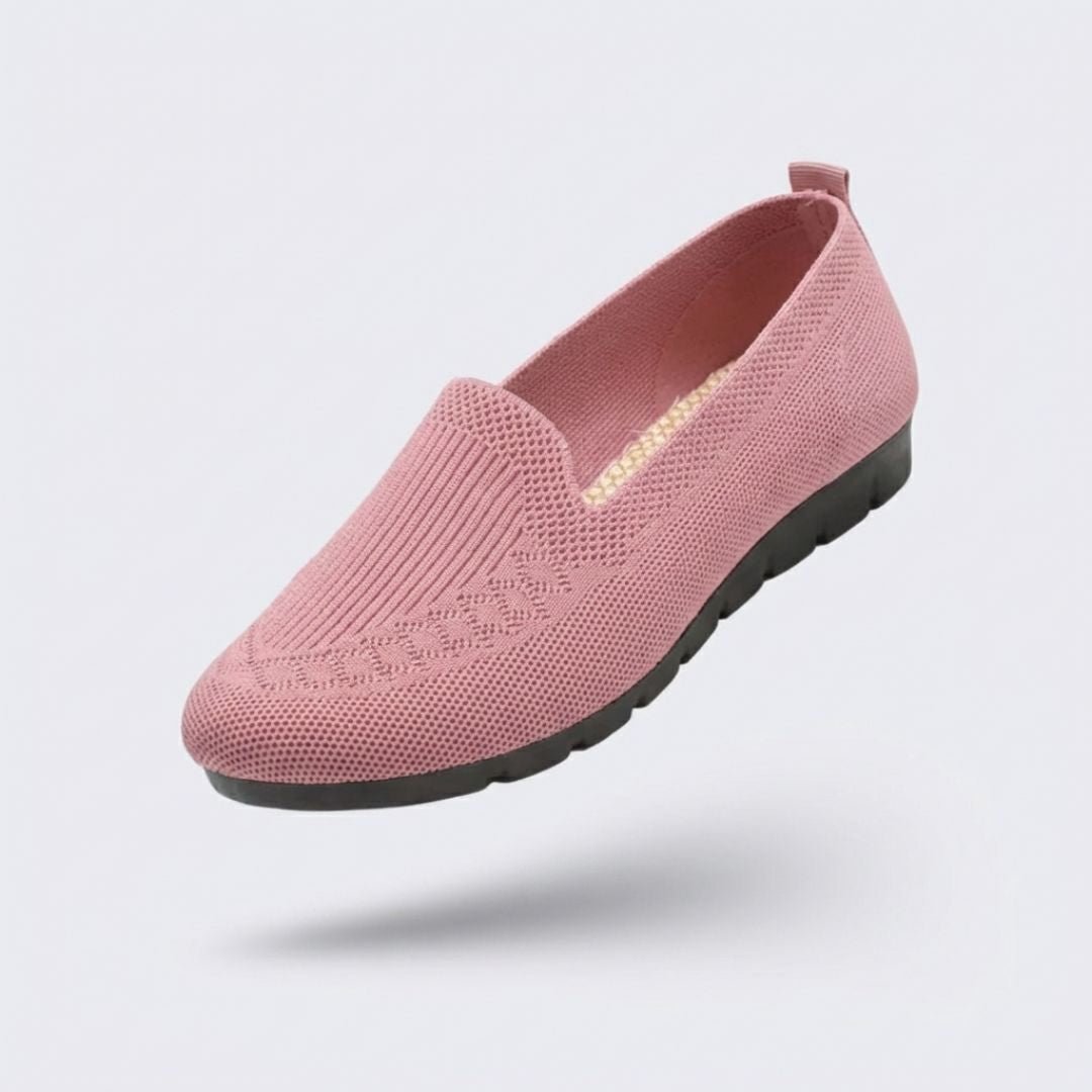 Black orthopedic flats for women with a soft rounded toe and padded insole