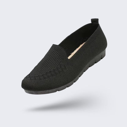 Black orthopedic flats for women with a soft rounded toe and padded insole