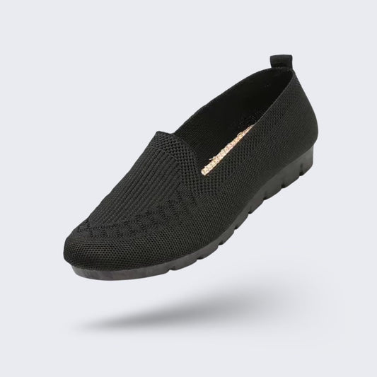 Black orthopedic flats for women with a soft rounded toe and padded insole