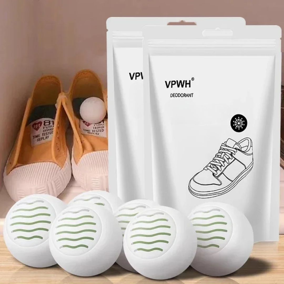 Pair of shoe deodorizer balls dropped inside shoes to absorb odor between wears