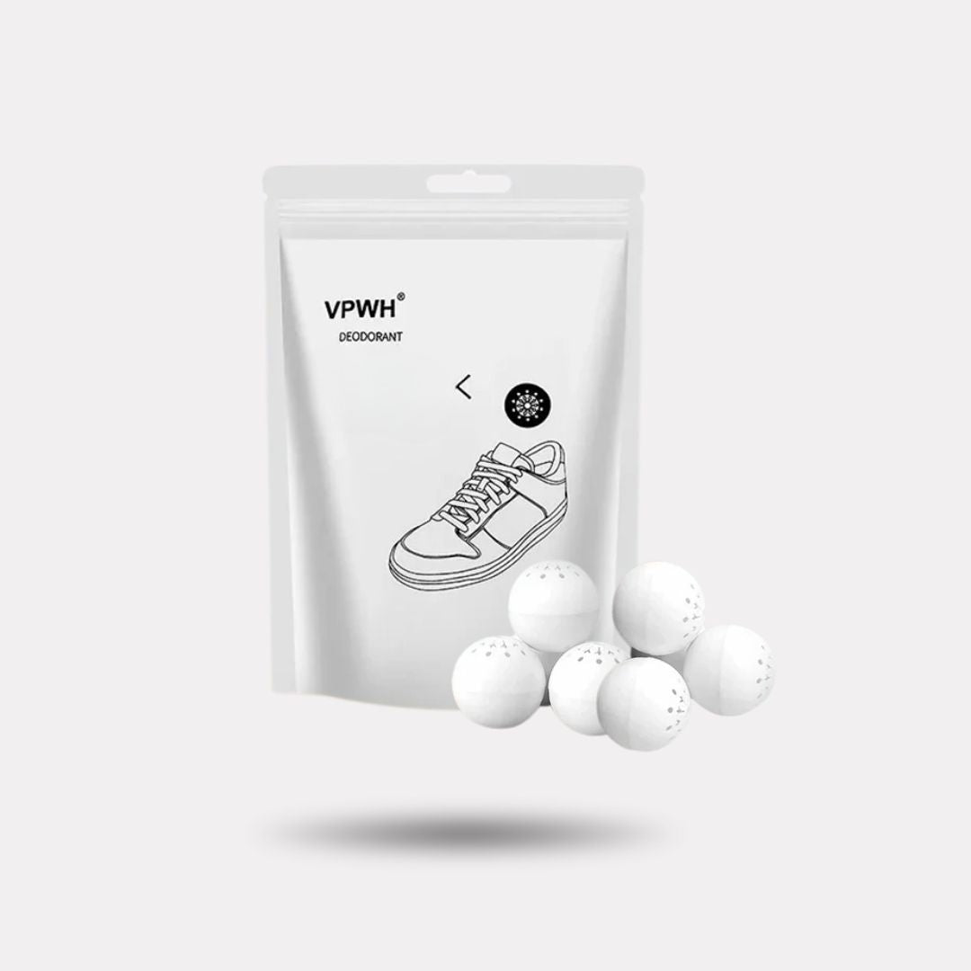 Pair of shoe deodorizer balls dropped inside shoes to absorb odor between wears